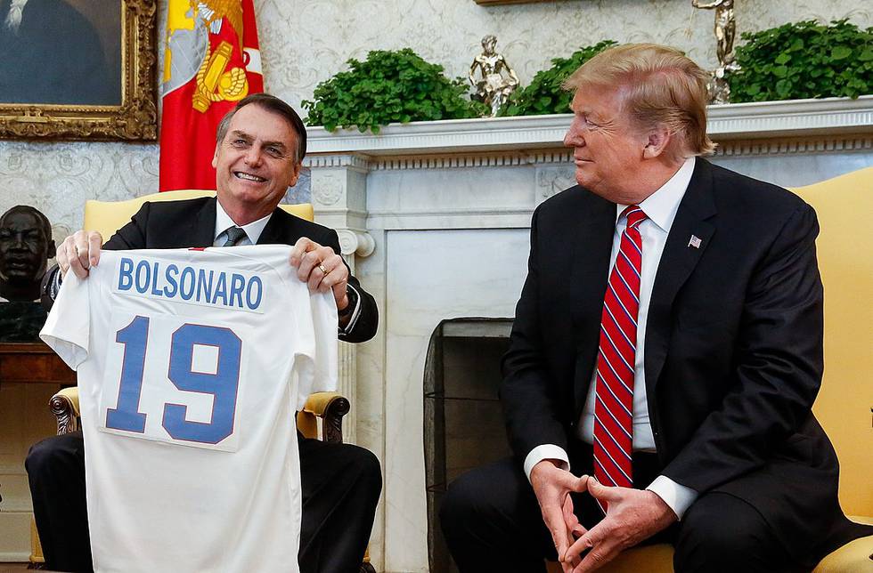 1094px-Bolsonaro_with_US_President_Donald_Trump_in_White_House,_19_March_2019.jpg